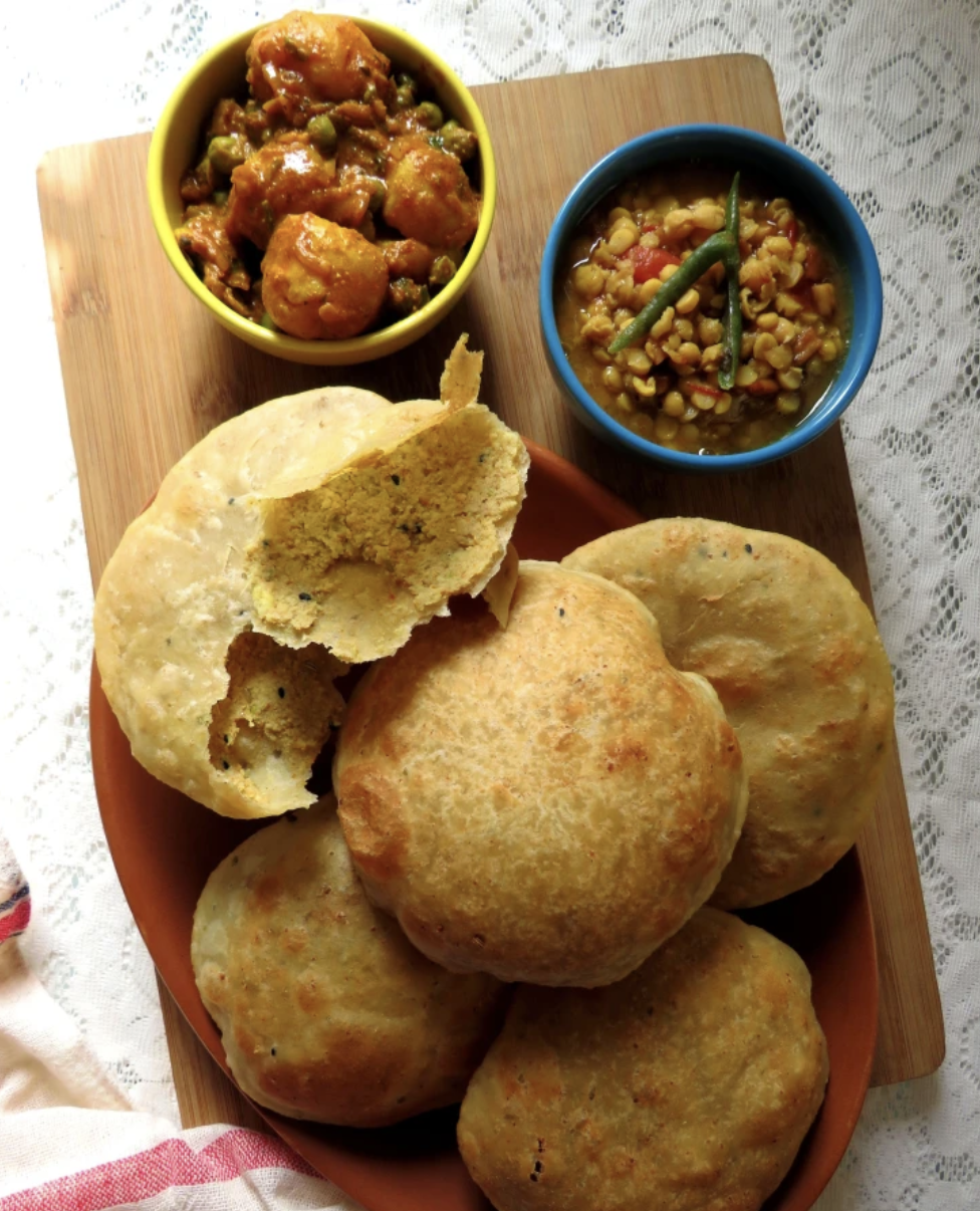 Bengali Food,Bengali Vegetarian Recipes,Vegan Recipes,vegetarian recipes,Bangali Recipes,No Onion No Garlic Recipes,Street Food Recipes,Bengali Recipes,bengali kochuri,bengali special recipe,radhaballavi recipe,Poori,Naan and Paratha,Puri Recipe,Featured,poori recipe,puffy poori,bengali dal poor,i radha ballavi,poori masala stuffed poori,Aloo dum,Bengali Food Blog,Bengali Food Photography,Durga Pujo,Food Photography,Indian Recipes,Kolkata Street Food,No Onion No Garlic,Radhaballabhi,Radhaballabhi ar Aloor Dum,Radhaballavi,Snacks,Street Food,Traditional Bengali Recipes,Traditional Recipes From Grandmas Kitchen,Vegetarian,indianflatbreads,simplytadka,indianbreads,maincourse,indianfood,cooking,blogging,food,recipe,homemade,vegetarian food,easy recipes,simple recipe,lunchbox recipe,dinner menu,breakfast,lunch menu,bloggingmarathon,paratha,roti,chapati,tawa cooking,regional food,radhabhallavi,maida poori,dal poori,fried recipe,urad dal,chana dal,bengal gram,fried,plain flour (maida),skinless split black gram